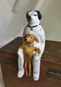 2 dogs balsa wood sculpture
