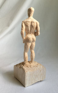 man balsa wood sculpture